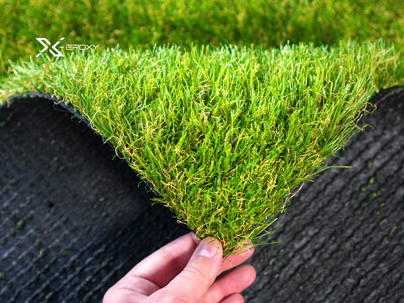 Thi công sân bóng đá cỏ nhân tạo: quy trình & báo giá 2 Cỏ nhân tạo