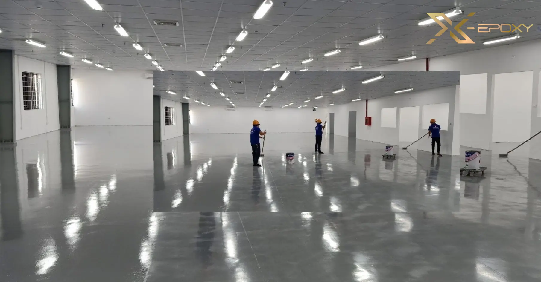Đội ngũ thi công X-Epoxy đang tiến hành sơn lót trước khi sơn sàn epoxy tầng hầm tòa nhà COBI