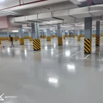Khu vực chính tầng hầm tòa nhà COBI đang được X-Epoxy kẻ vạch phân khu vực đỗ xe